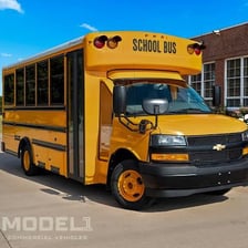 A school bus and a touring coach representing two uses of buses.