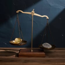 Balanced scales representing equilibrium and stasis.