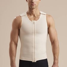 Several sleeveless vests displayed as garments