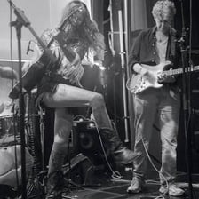 A band performing music in an alt-country style