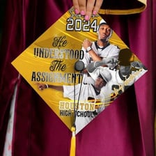 Graduating high school seniors wearing caps and gowns