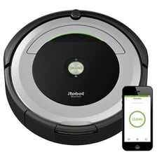A Roomba robotic vacuum cleaner on a floor.