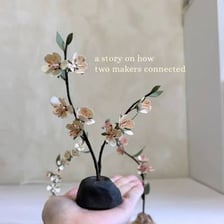 A flower stem supporting a blossom and connecting it to the plant.