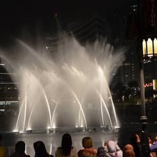 The Dubai Fountain performing in front of the Burj Khalifa.