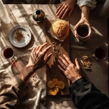 People sharing a meal together around a dining table