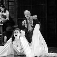 A stage actor displaying an exaggerated emotional expression