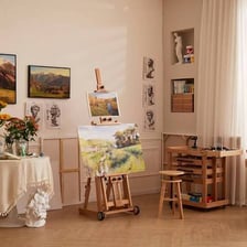 An easel holding a canvas in an art studio