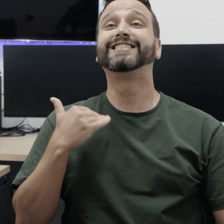 A person making a dismissive hand gesture