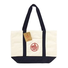 A reusable Trader Joe’s grocery tote bag.