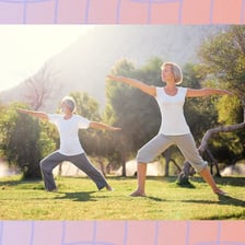 An older adult moving energetically during outdoor exercise.