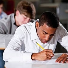 A student working on a standardized admissions exam