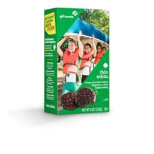 A package of Girl Scout Thin Mints cookies with several cookies displayed.