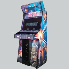 An Atari arcade cabinet running Asteroids