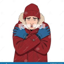 A bundled-up person shivering outdoors in cold weather