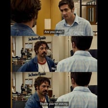 One person reassuring another during a conversation.