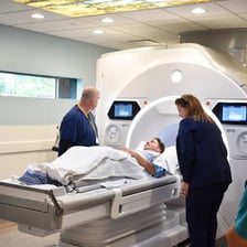 A patient undergoing a magnetic resonance imaging scan