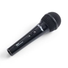 A microphone set up on a stage for an open-mic performance.