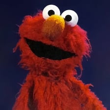 Elmo, the red Muppet character from Sesame Street.