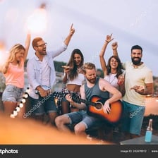 Friends enjoying themselves at a lively party