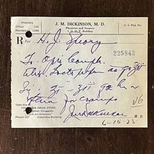 A doctor writing a prescription.
