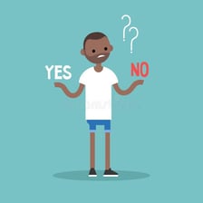 A person considering signs labeled yes and no