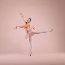 A ballet dancer wearing a tutu during a performance.