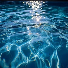 Sunlight glistening across the surface of water.