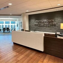 Attorneys working in a professional law-firm office.