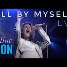 Celine Dion performing onstage.