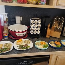 A home-cooked dinner being prepared in a kitchen