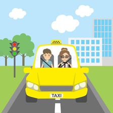 A passenger riding in the back seat of a city taxi.