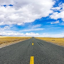 A multilane highway with painted lane markings