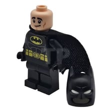 A LEGO Batman minifigure in black Batman costume