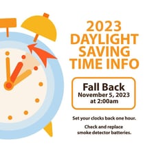 A clock being set back one hour for the end of daylight saving time.