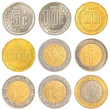 Mexican peso banknotes and coins.