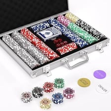 Poker chips gathered in the center of a poker table.