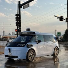 A Waymo self-driving vehicle traveling on a city street