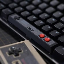 A computer keyboard with its long space bar visible.