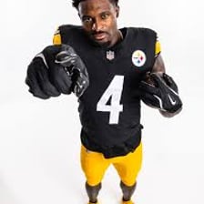 A Pittsburgh Steelers football player wearing the team’s black and gold uniform.