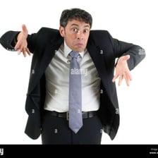 A person raising their shoulders in a shrug