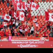 A Canadian flag displayed during a ceremonial singing of the national anthem