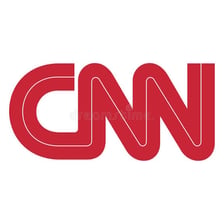 A CNN news studio or broadcast display showing the CNN logo.