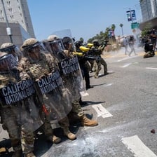A crowd protesting in a city street