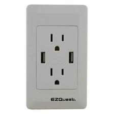 A plug inserted into a household electrical wall outlet.