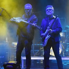 Blue Öyster Cult performing onstage.