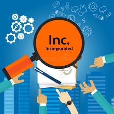 A business sign displaying a company name followed by “Inc.”