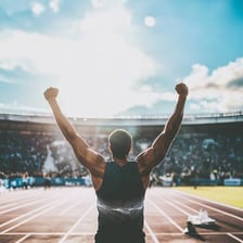 An athlete celebrating a win