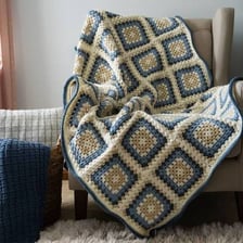 Colorful crocheted Afghan blankets made from granny squares