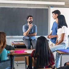A student receiving guidance from a mentor
