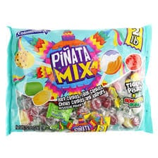 A brightly decorated piñata filled with candy at a party.